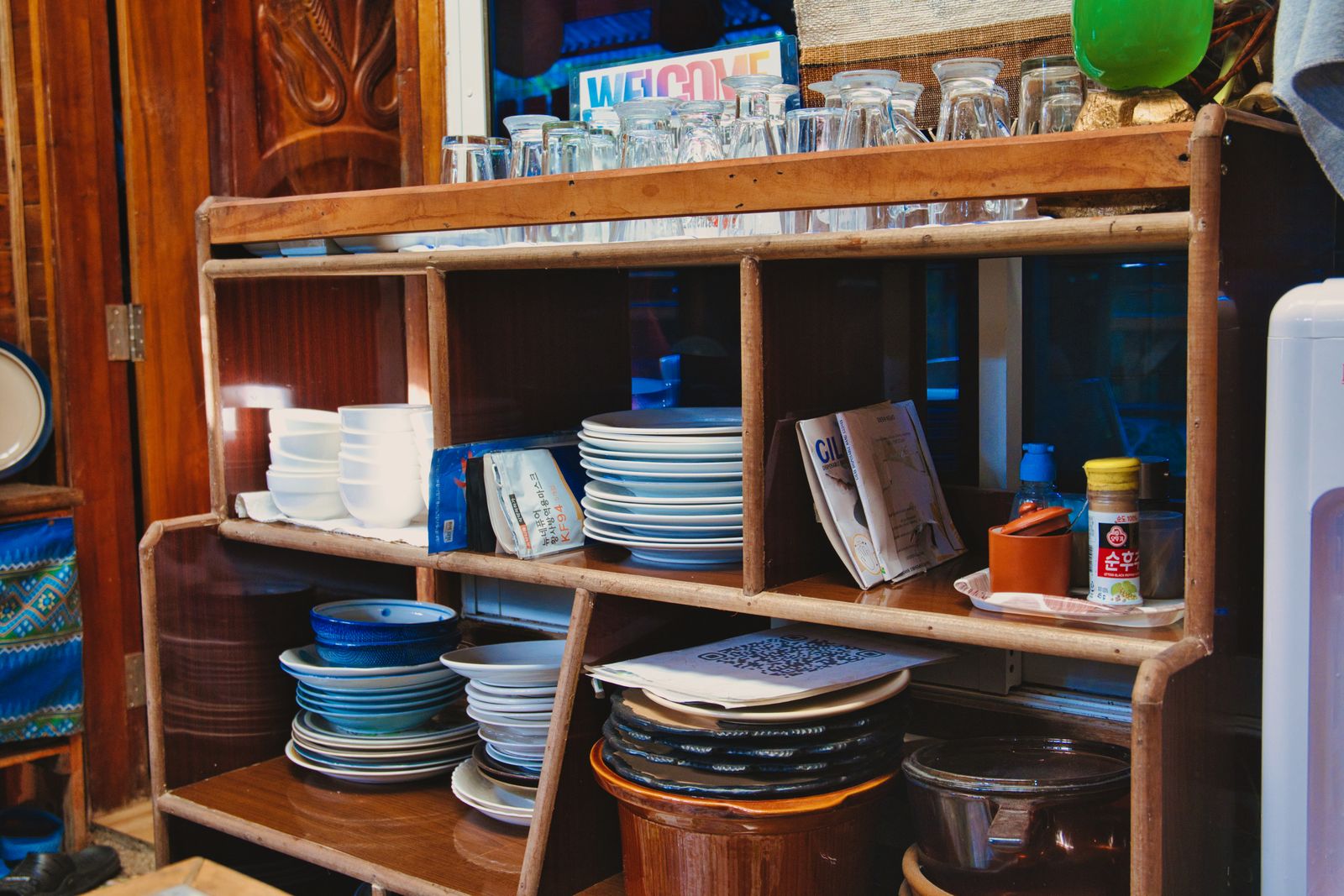 Open shelving and dishes in a finished kitchen